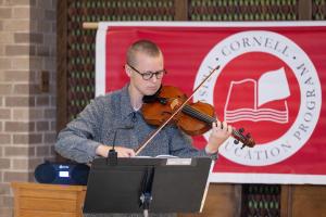 Violinist Drake performs at the Commencement Ceremony at Auburn CF, Oct. 13, 2023.